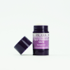Geöffneter Face-Zincbalm Stick von INUANA für die Gesichtspflege mit abgeschraubtem, violettem Deckel.