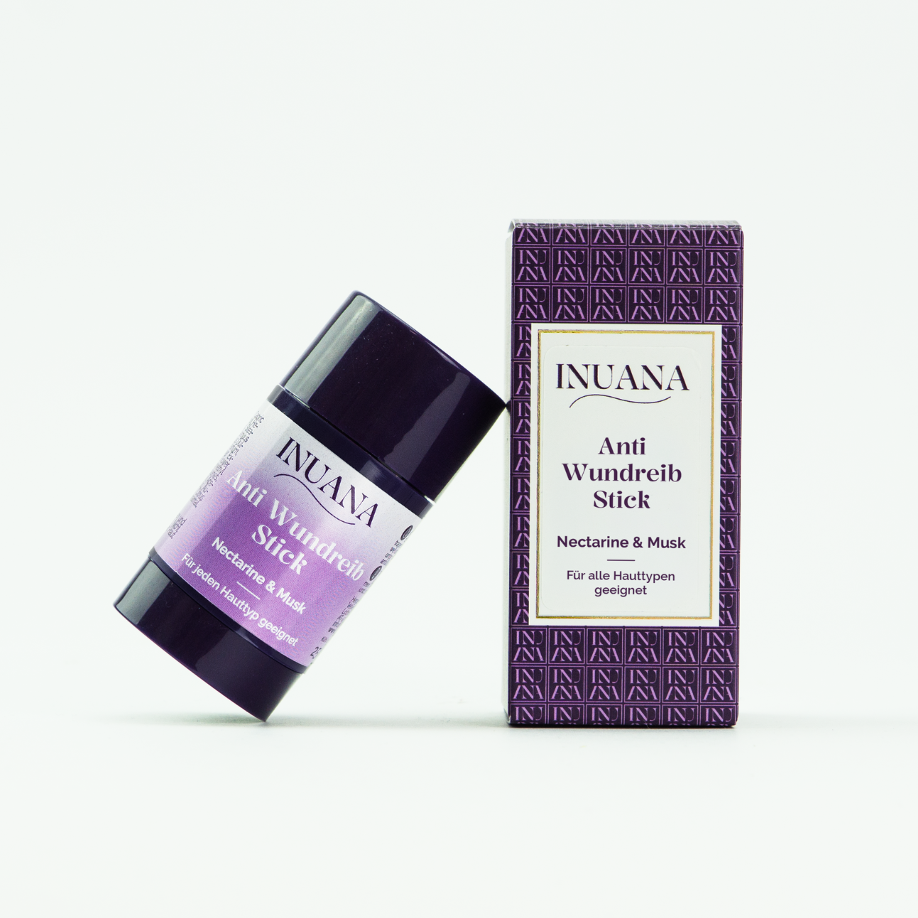 INUANA Anti-Wundreib Stick Nectarine & Musk im lila Kosmetik-Stick mit passender Verpackung